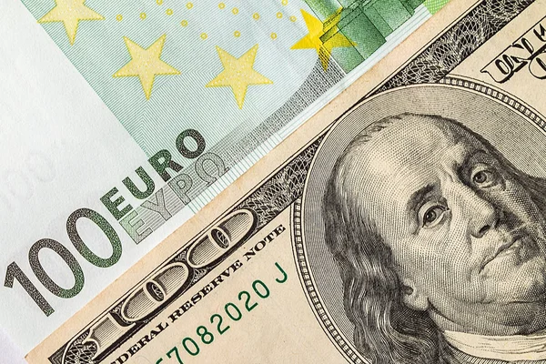 Na tle pieniędzy. Dolar i Euro — Zdjęcie stockowe