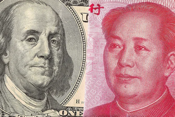 我们美元的钞票和中国人民币钞票宏 — 图库照片