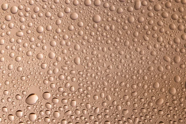 Close-up van water druppels op glazen oppervlak — Stockfoto