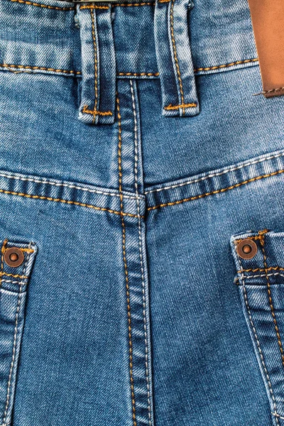 Bolso e rebite em jeans, fundo — Fotografia de Stock