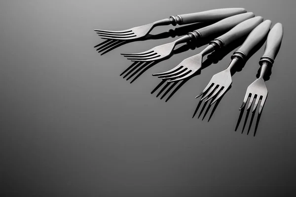 Set of forks. Five  pieces.  On  gray background — Stock Photo, Image