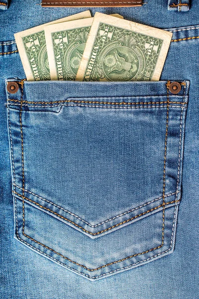 Dolar banknoty w kieszeni jeansów zbliżenie. — Zdjęcie stockowe