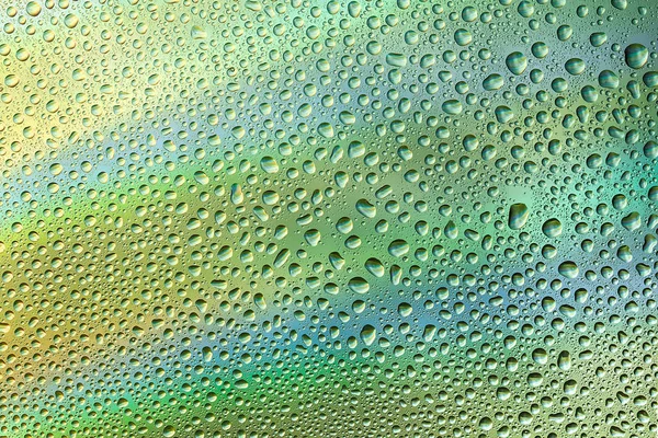 Closeup of water drops on glass surface — Stock Photo, Image