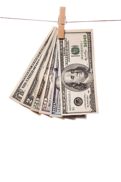 Dollarsedlar på klädnypor på vit background.1 — Stockfoto