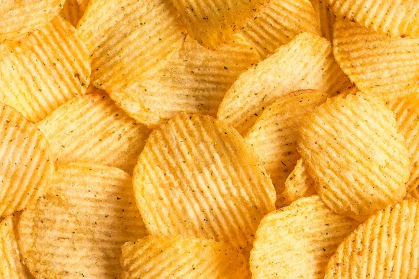 Potato chips texture background. Potatoes pattern.