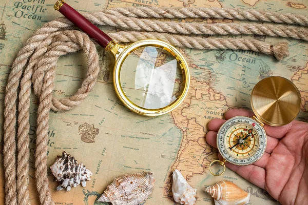 Old vintage retro compass,  magnifying glass on ancient world ma — Stock Photo, Image