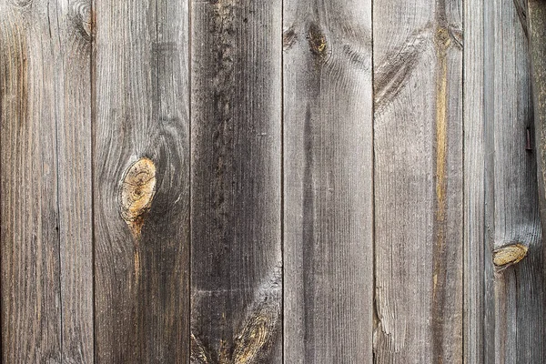 Bakgrunden textural grå rustik trästaket. — Stockfoto