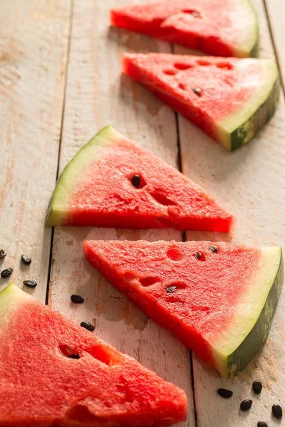 Fresh sliced watermelon  on wooden table — Stock Photo, Image