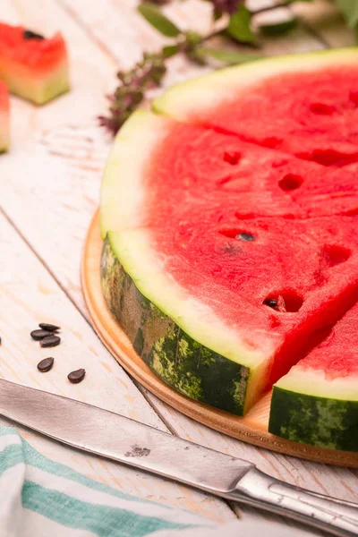 Fresh sliced watermelon  on rustic  table. — Stock Photo, Image