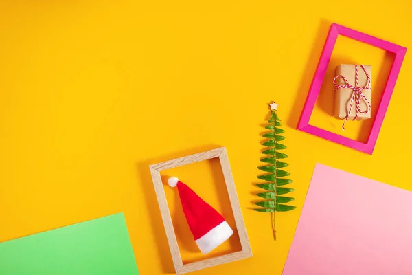 Geometric creative Christmas flat lay on colorful pastel trendy background. — Stock Photo, Image