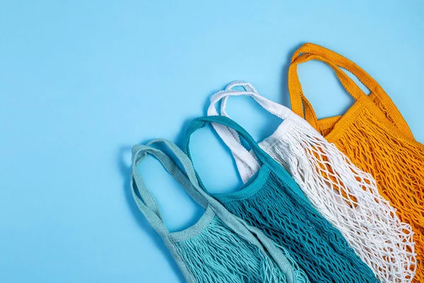 Zero waste concept. Textile eco bags on blue background. — ストック写真