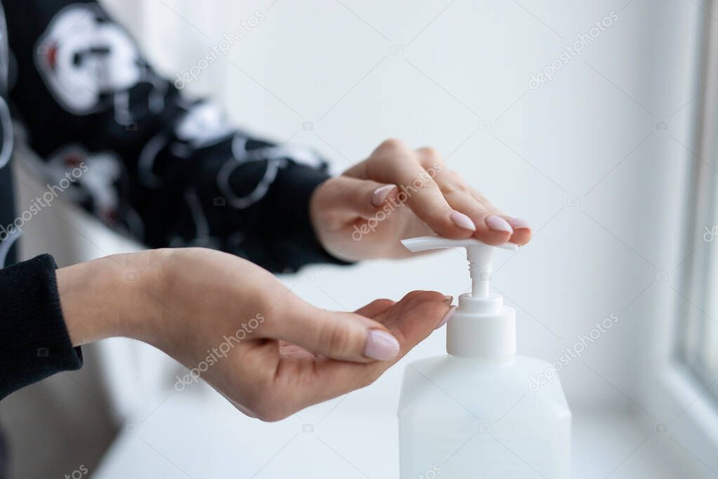 Woman hands sanitizer prevent virus covid-19 coronavirus.