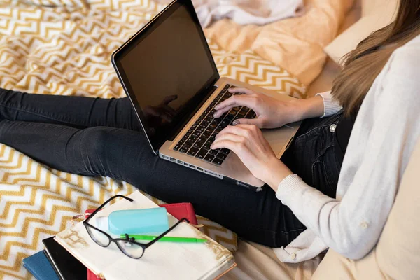 closeup woman girl student working with a laptop notebook, online learning education shopping training, work at home