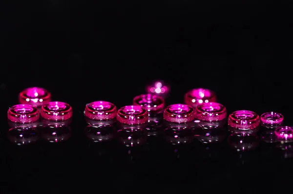 Watch Parts: Hole Jewels Gathered on a Black Background