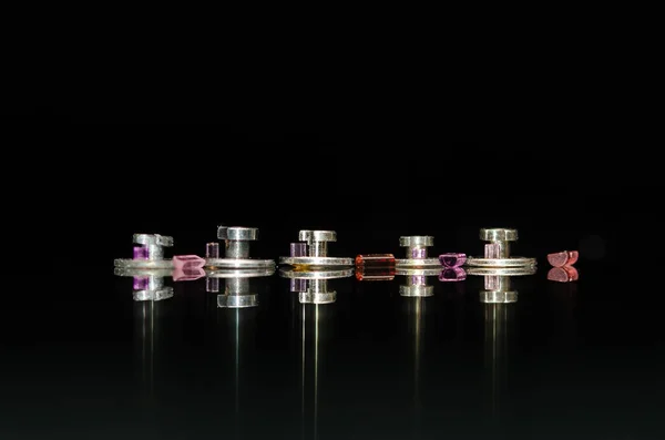 Watch Repair: Five Roller Tables and Roller Jewels Against a Black Background — Stock Photo, Image