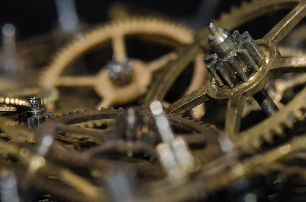Watch Parts: Collection of Vintage Metallic Watch Gears on a Black Surface — Stock Photo, Image