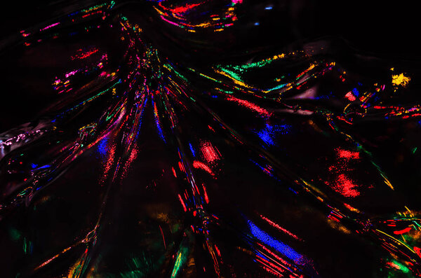 Abstract: Colored Lights Reflecting in the Darkness