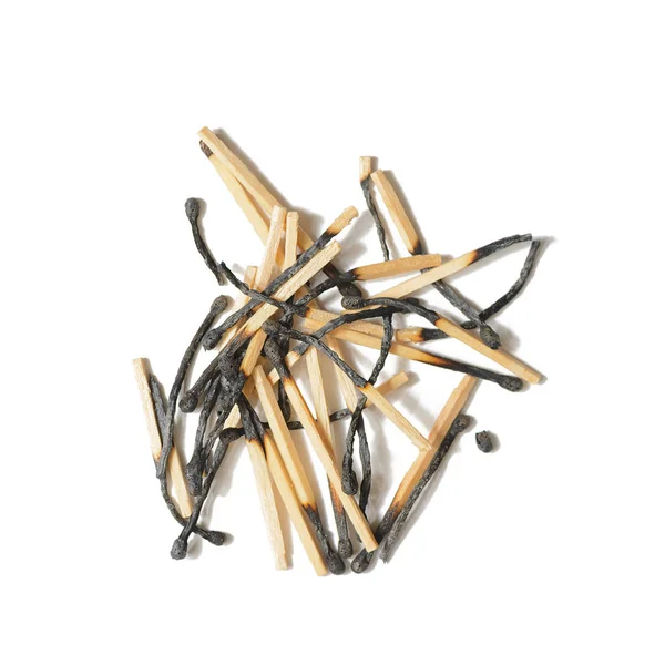 Pile of burnt matches on a white background — Stock Photo, Image