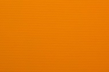 Büyük mattin bir doku ile turuncu renk duvar kağıdı boyalı