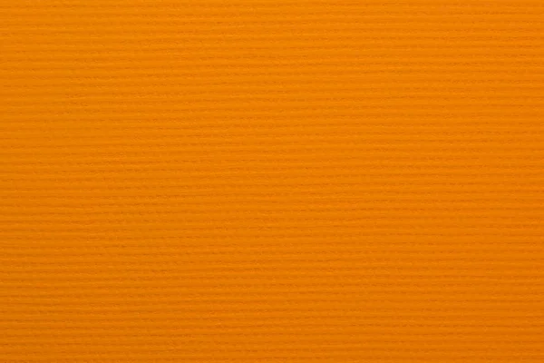 Pintado en color naranja fondo de pantalla con una textura de gran mate — Foto de Stock