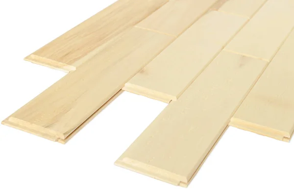 Light wooden surface made of short boards. Diagonal view from th — Stock Photo, Image