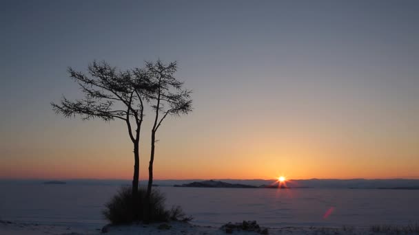 Prores codec. Winter. Sunset and sunrise on Lake Baikal, covered with ice and snow — Stock Video