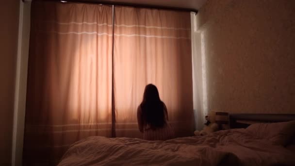 Young Girl Long Dark Hair Light Nightgown Wakes Large Bed — Stock Video