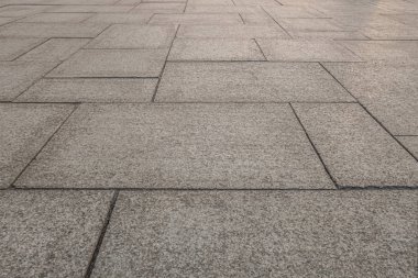 Granit levhalarla kaplı kaldırımın soyut arkaplanı