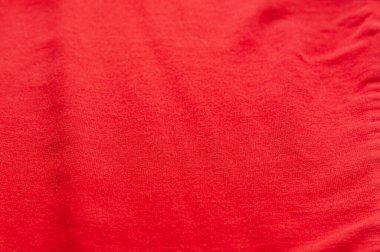 Eski kırmızı örgü kumaşın soyut arkaplanı