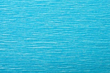 Yatay dokusu yakın çekilmiş turkuaz baskılı kağıdın arkaplanı