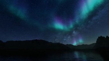 Mavi arka planda kuzey ışıkları. Kış doğası. Kış Noel manzarası. Kuzey manzarası. Gece renkli bir manzara. Kış karı. Norveç manzarası. Donmuş buz.