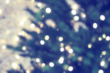 Soyut noel ışıkları noel ağacının ışıklarını söndürdü.