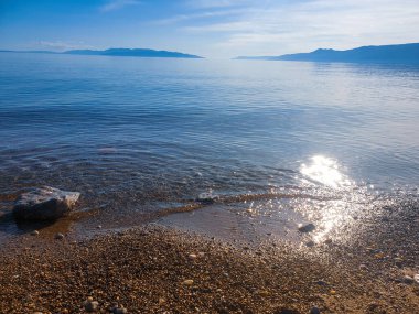 Kumsal, gökyüzü ve deniz