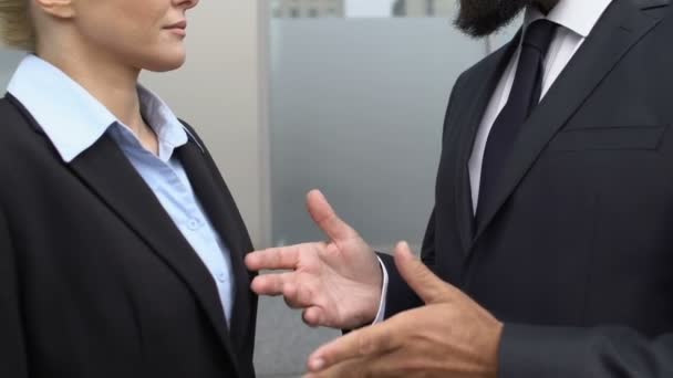 Bearded company chief touching shoulder of secretary outdoor, sexual harassment — Stock Video