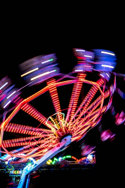 Colorful Light Trail Fast Carrousel Fun Park Night Royalty Free Stock Images