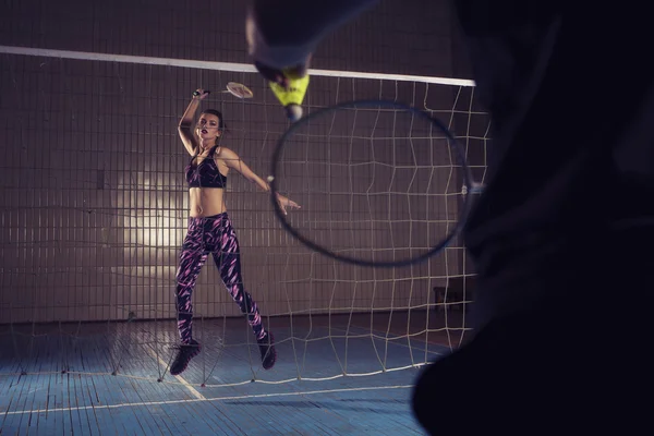 Fit slim young beautiful brunette woman in sportswear playing ba — Stock Photo, Image