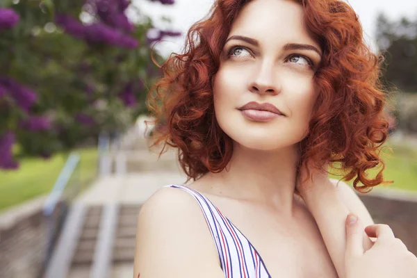 Beautiful red haired woman with fresh flawless skin and curly ha — Stock Photo, Image