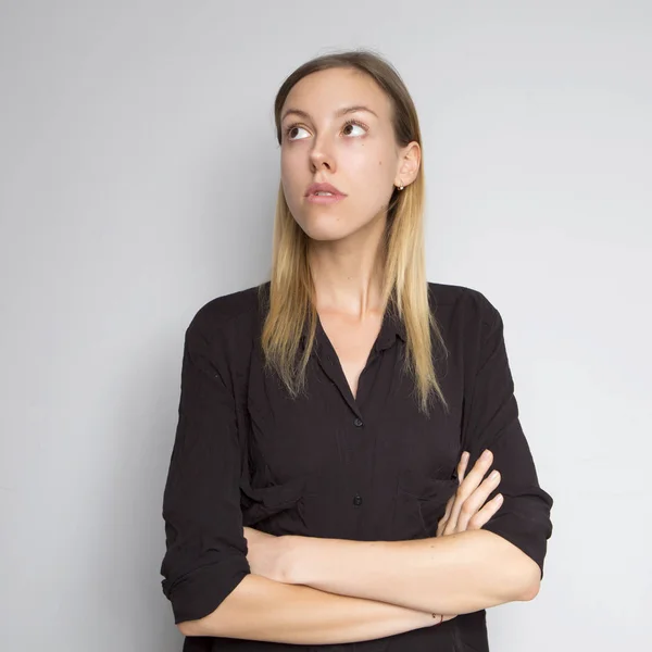 Beautiful brunette caucasian woman in dark black blouse with bri — Stock Photo, Image