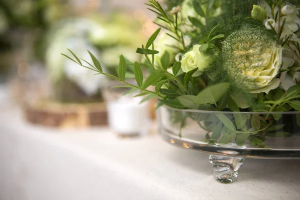 Fresh eustoma roses bouquet composition on a table in a glass va — Stock Photo, Image