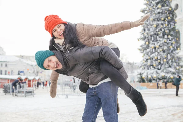 Cheerful smiling caucasian couple of man and woman having fun on — Stock Photo, Image