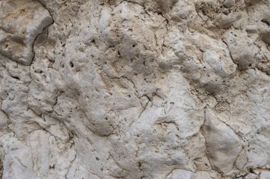 Eski bir çöl kayası ve taşının dokusu. Üst görünüm, alanı kopyala.