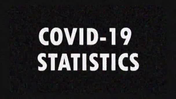 4K 。テレビのニュースや広告のためのテキストCOVID-19 STATISTICSでグリッチスクリーンセーバー。コロナウイルスの流行. — ストック動画