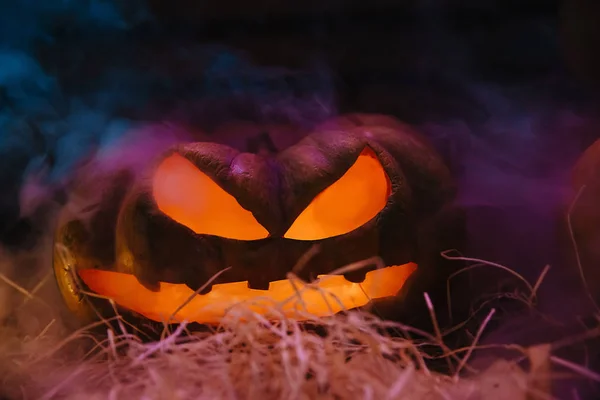 Laughing pumpkin with a candle inside — Stock Photo, Image