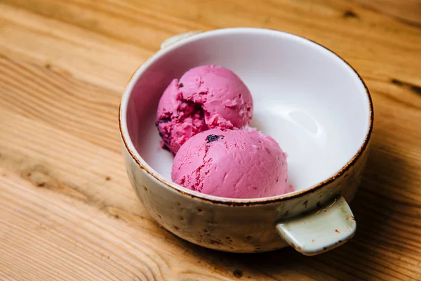 Ice cream in bowl on a wooden table. — 스톡 사진