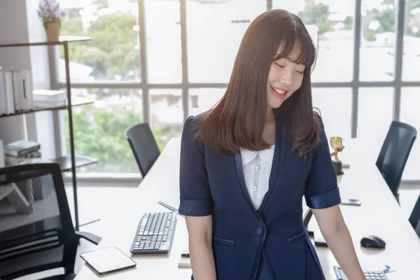 Office lady is beautiful asian in modern office