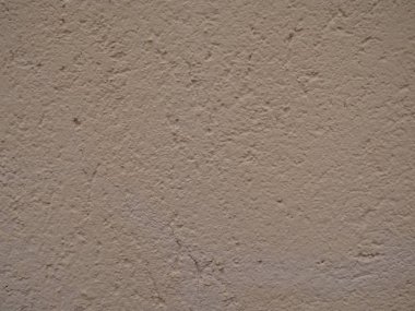 Kahverengiye boyanmış beton duvar.