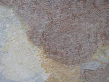 Kahverengi, beyaz ve bej farklı tonlarda taş desenli duvar kağıdı.