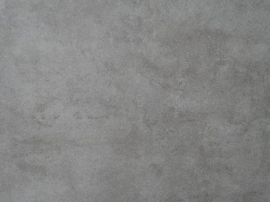 Doku ve grinin farklı tonlarıyla beton duvar.