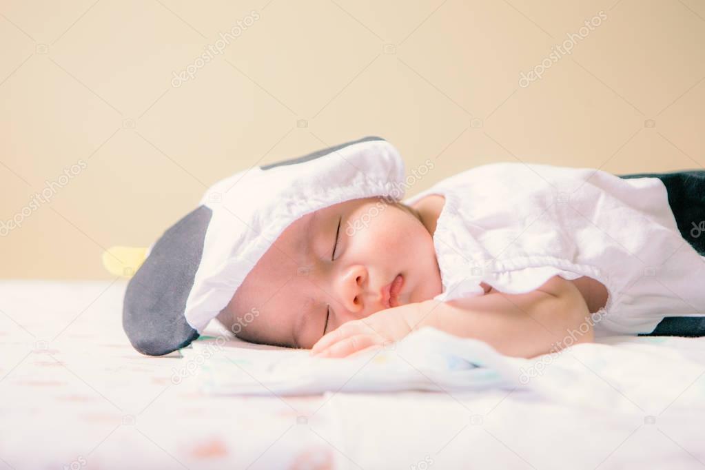 Newborn asian baby smile