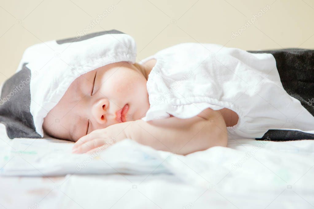 Newborn asian baby asleep